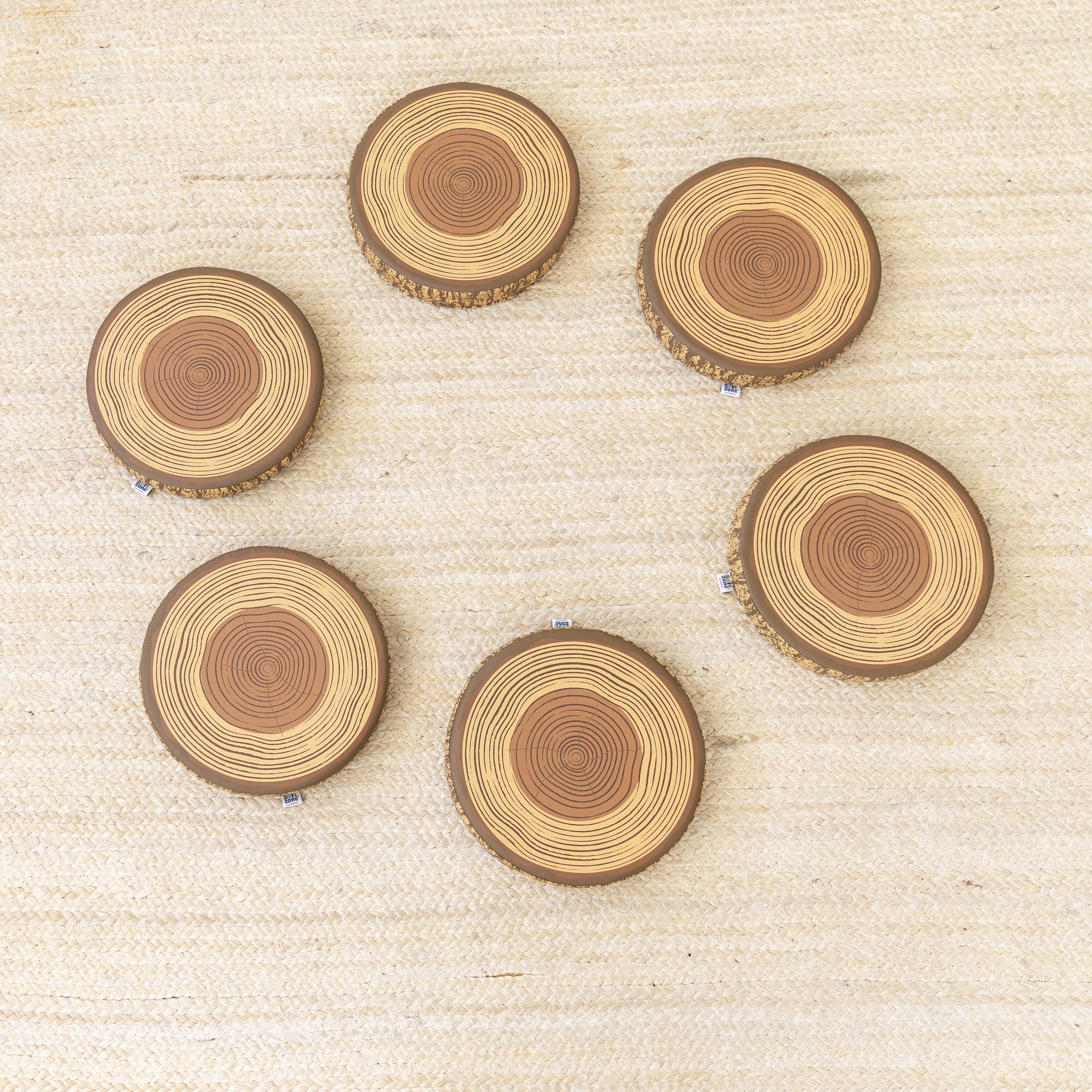 Preschool Nature-Inspired Reading Circle with Tree Log Seating and Book Display