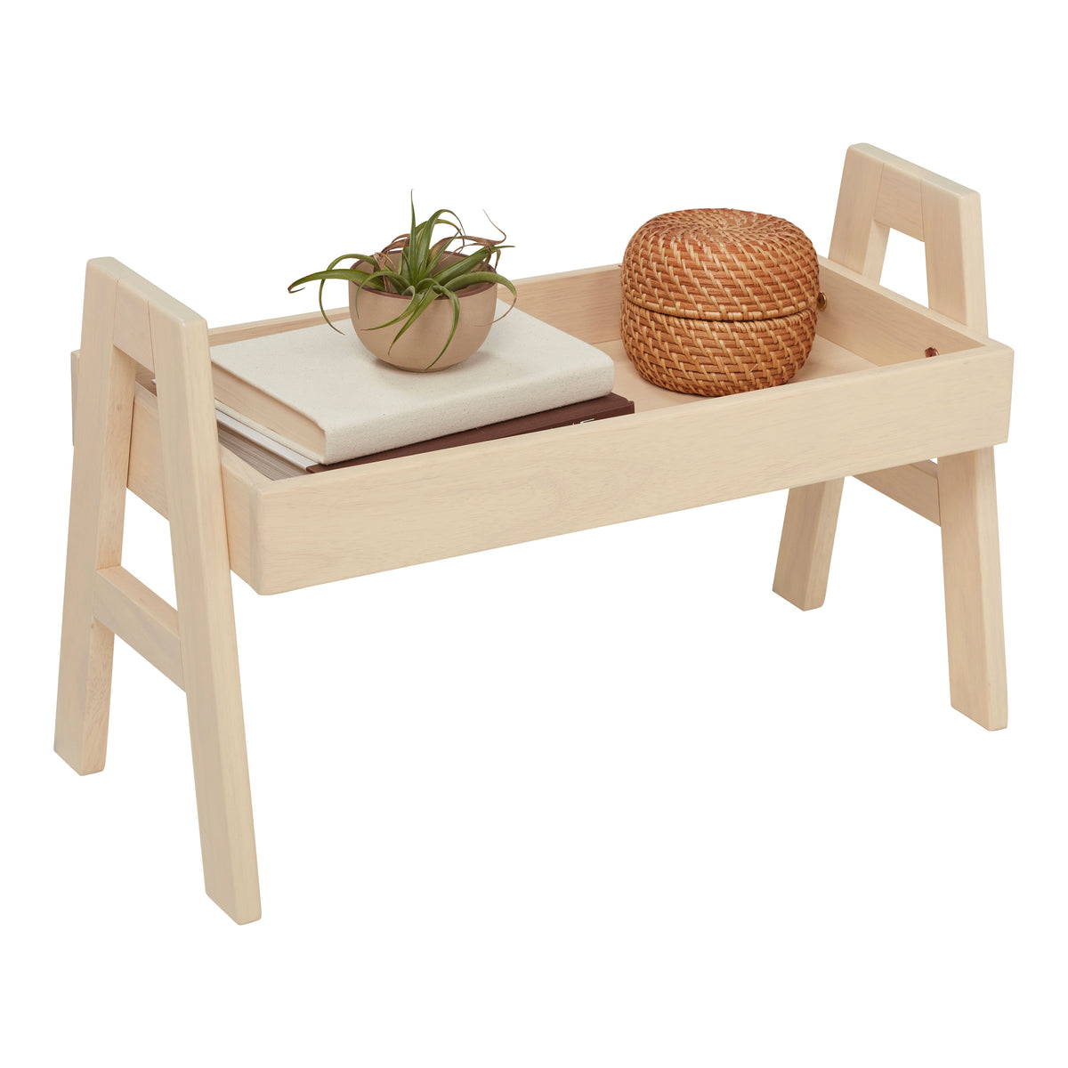 Natural wood shelf organizer with handles holding a potted plant, woven basket, and stacked items.