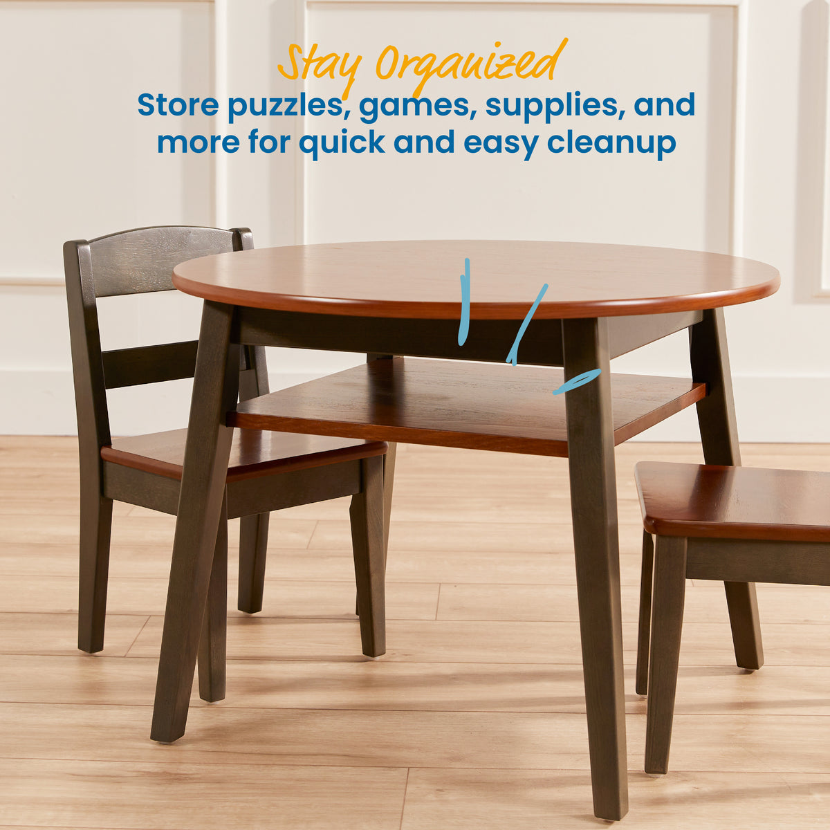 Brown wooden round table with storage shelf and two matching chairs on wood floor.